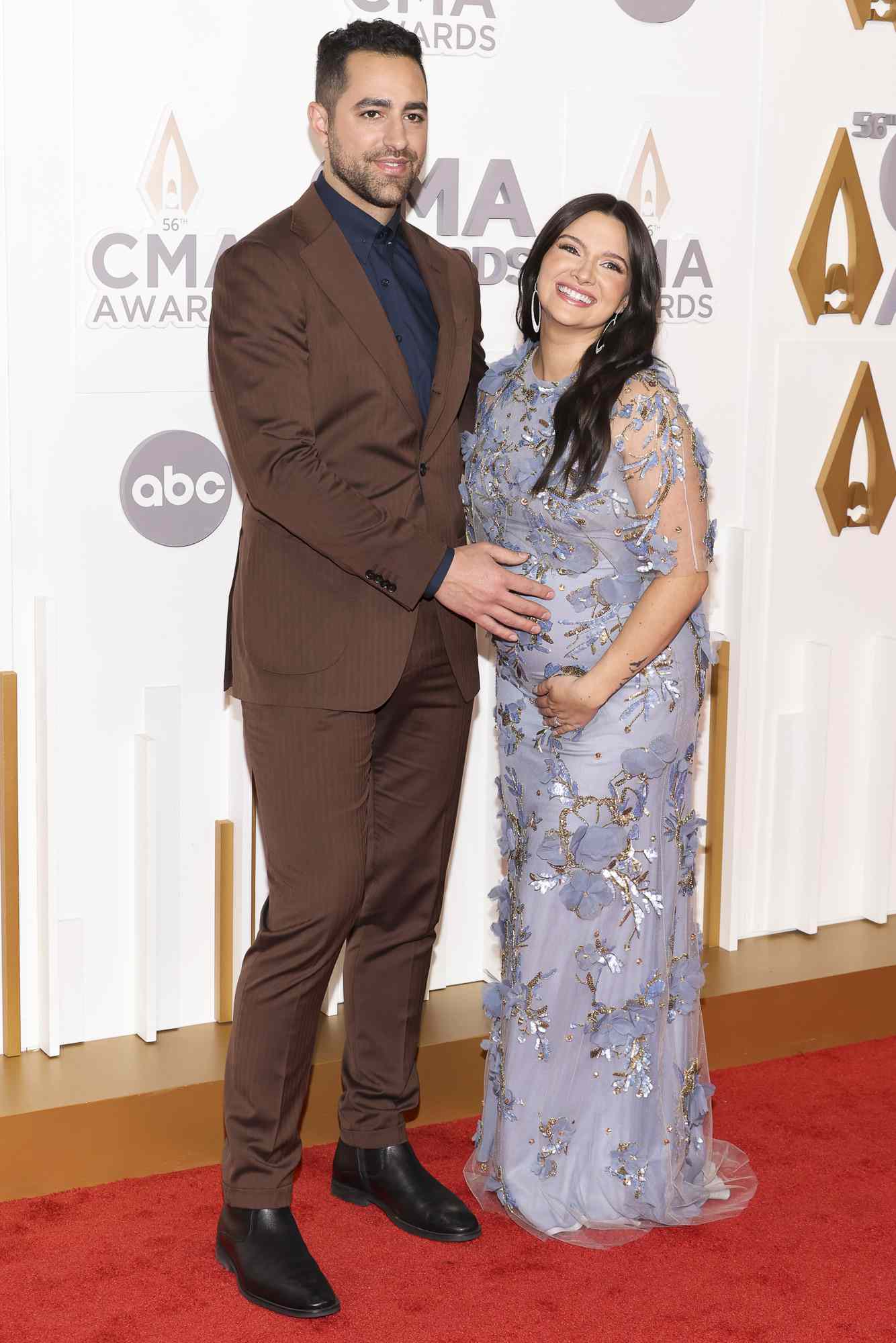 Surprise! At the CMA Awards, Katie Stevens of The Bold Type and her husband Paul DiGiovanni announce their pregnancy.