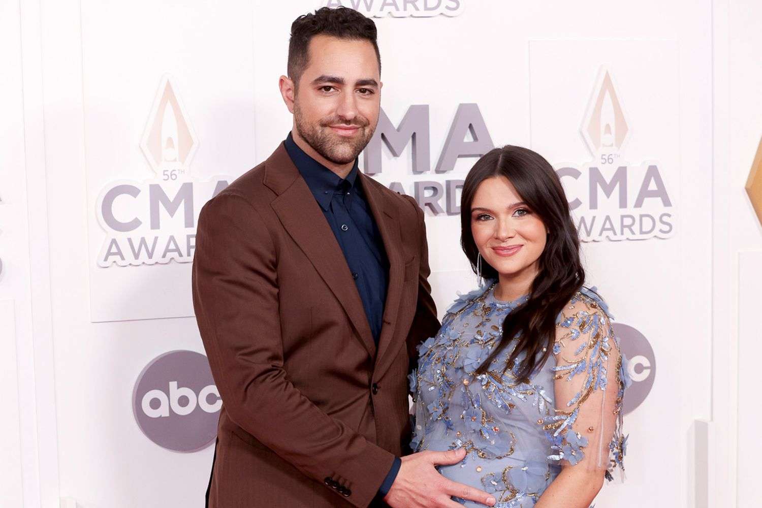 Surprise! At the CMA Awards, Katie Stevens of The Bold Type and her husband Paul DiGiovanni announce their pregnancy.